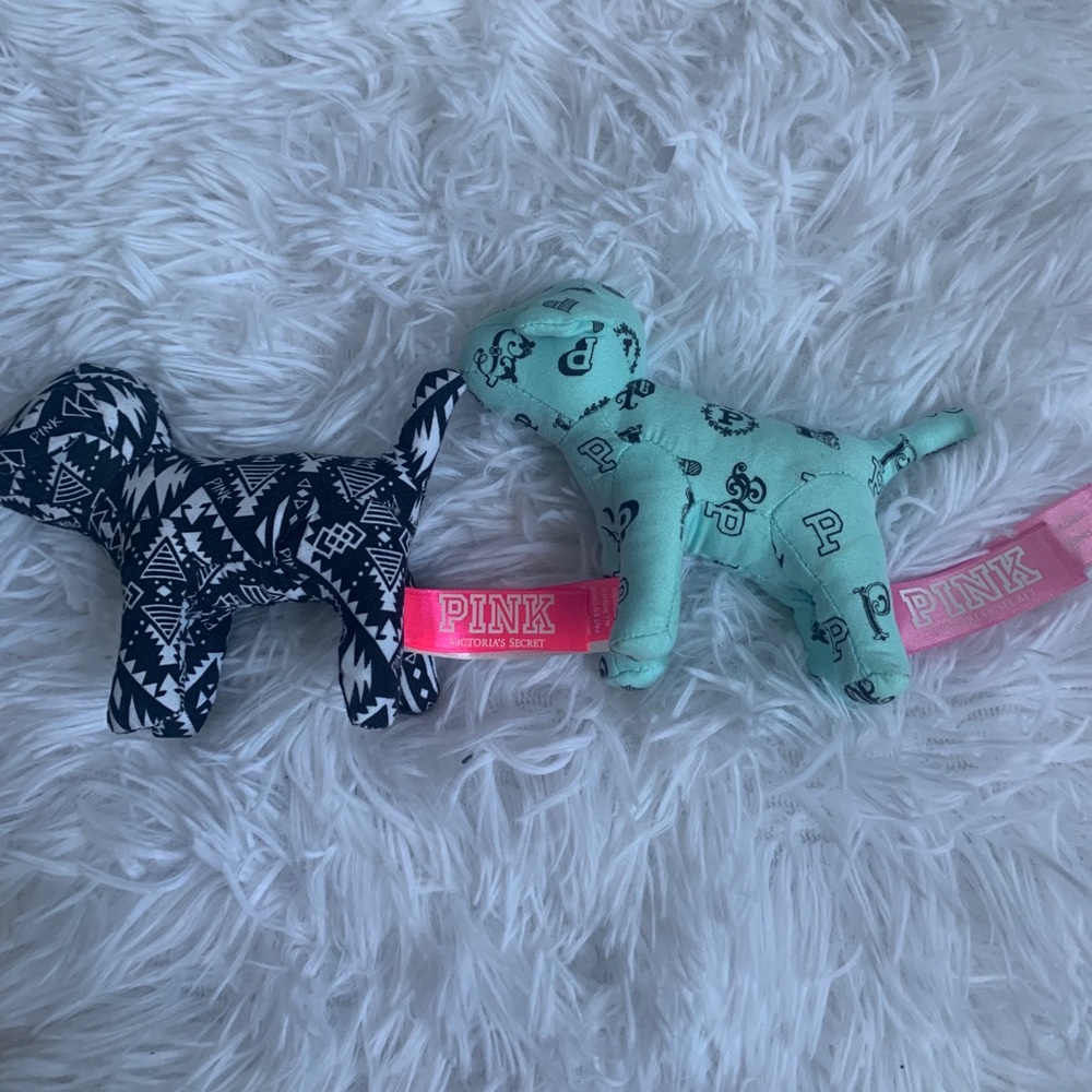 two mini victoria secret pink dogs